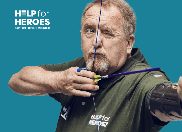 Man pulling back an archery bow | Help for Heroes